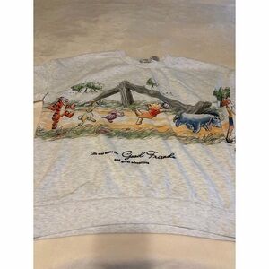 NWOT. Women’s Pooh and 
Friends sweatshirt